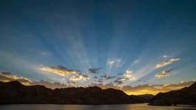 Majestic Sunset Crepuscular Rays over Mountain Silhouette - Powered by Shutterstock - Get 15% off with code: PIKWIZARD15