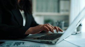 Professional Business Person Engaging in User Analytics on Laptop in Modern Office Setting. Asymptotic smart data analytic. - Powered by Shutterstock - Get 15% off with code: PIKWIZARD15