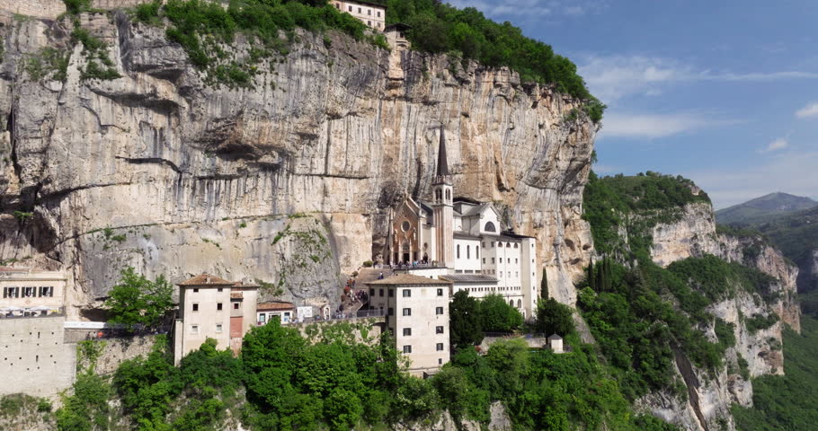Santuario Madonna della Corona - Popular Church In The Cliff In The Mountain Alps In Italy. - aerial shot