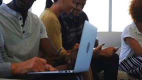Five colleagues typing and scrolling at table, showing finance charts and graphs overlaying scene. Technology, collaboration, data visualization, business, workspace, professional, analytic - Powered by Shutterstock - Get 15% off with code: PIKWIZARD15
