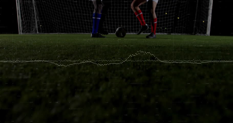 Two soccer players competing for ball at goal on grass field at night, with technology overlay. Athletes, competition, digital, sports, dynamic, night, energy