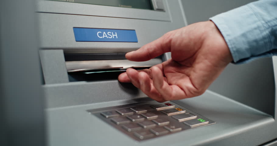 ATM Machine User Pressing Buttons on Display Screen, Taking Money from Cash Dispenser. Cash Withdrawal Operation from Bank Account. Automated Teller Machine, Banking System and Transactions. Close Up.