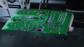 Close-up of Component Installation on Circuit Board. Electronic Devices Production Industry. Fully Automated PCB Assembly Line Equipped with Advanced High Precision Robot Arms. Electronics Factory. - Powered by Shutterstock - Get 15% off with code: PIKWIZARD15