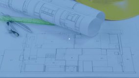 Unrolling blueprint set on drafting desk with ruler, compass, helmet and floating digital icons. Architecture, engineering, design, drafting, innovation, construction, blueprint - Powered by Shutterstock - Get 15% off with code: PIKWIZARD15