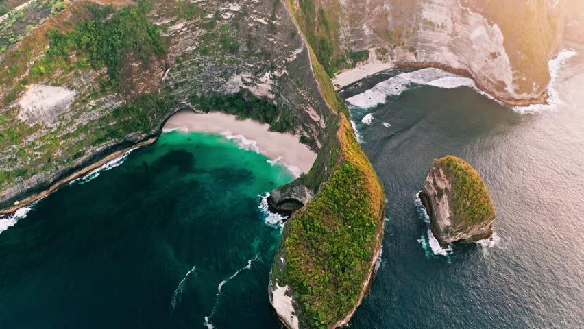 famous beach in Bali, Bali tropical lagoon, aerial view of paradise Nusa Penida island in Indonesia, amazing bay in Indonesia, idyllic Bali travel . High quality 4k footage