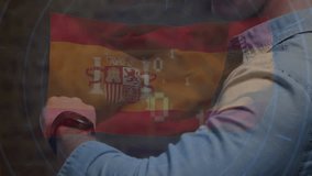 man monitoring trading in finance, showing animated charts percentages with Spanish flag overlay. Technology, finance, analytics, business, investment, digital, professional - Powered by Shutterstock - Get 15% off with code: PIKWIZARD15