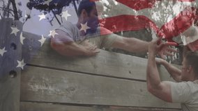 Three comrades climbing wooden obstacle wall in military training course with faint flag overlay. Team, teamwork, outdoor, rugged, determined, endurance, unity - Powered by Shutterstock - Get 15% off with code: PIKWIZARD15