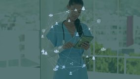 Female healthcare worker tapping tablet in medical corridor, displaying floating network icons. Healthcare, technology, communication, professionalism, innovation, diagnostics, digital - Powered by Shutterstock - Get 15% off with code: PIKWIZARD15