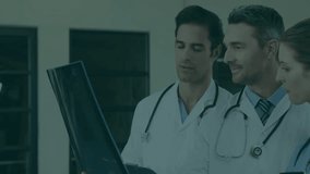 Three doctors using holographic data panels in healthcare, reviewing charts maps numeric readouts. Medical, collaboration, futuristic, technology, analytics, innovation, healthcare - Powered by Shutterstock - Get 15% off with code: PIKWIZARD15