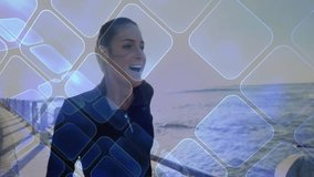 female athlete pausing run on seaside path displaying smartwatch data and AR technology overlays. Athletic, technology, fitness, urban, modern, activewear, wellness - Powered by Shutterstock - Get 15% off with code: PIKWIZARD15