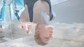woman performing aerial yoga inversion in fitness studio, showing network icons overlay. Illness, relaxation, wellness, minimalism, digital, versatility, fitness - Powered by Shutterstock - Get 15% off with code: PIKWIZARD15