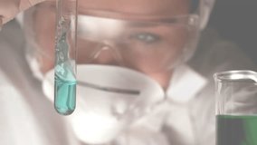 Female scientist examining test tube in research lab, showing molecular diagrams overlaying frame. Scientist, laboratory, research, chemical, innovation, science, technology - Powered by Shutterstock - Get 15% off with code: PIKWIZARD15