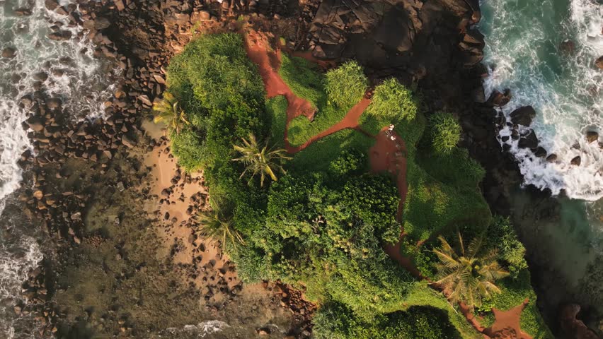 Breathtaking aerial view Mirissa Beach and Parrot Rock, showcasing pristine turquoise waters, golden sandy shores, rocky coastal formations, southern Sri Lanka. Vibrant tropical landscape indian ocean