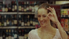 Mid adult woman holding bottle in retail aisle, smiling at translucent data chart overlay. Retail, analytics, technology, shopping, consumer, dashboard, modern - Powered by Shutterstock - Get 15% off with code: PIKWIZARD15