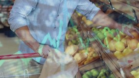 Mid adult man holding yellow fruit among wooden produce bins, showcasing retail data line charts. Fresh produce, retail analytics, healthy eating, grocery shopping, market trends, diet, consumer - Powered by Shutterstock - Get 15% off with code: PIKWIZARD15