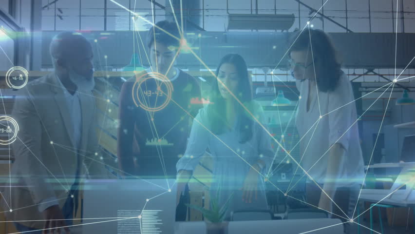 business team standing around desk in open office, reviewing data with holographic network charts. Collaboration, teamwork, innovation, technology, professional, startup, analysis