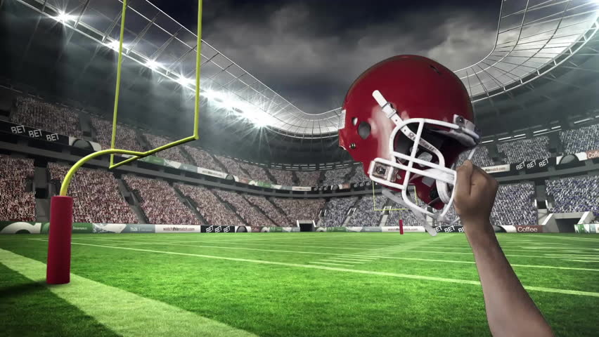 male fan holding red helmet in football stadium, showing packed crowd and floating heart overlays. Sports, audience, stadium, adrenaline, celebration, outdoor, energic