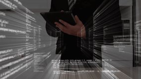 Business professional man standing over tablet in office, showcasing cybersecurity code streams. Corporate, technology, innovation, cybersecurity, data, analysis, digital - Powered by Shutterstock - Get 15% off with code: PIKWIZARD15