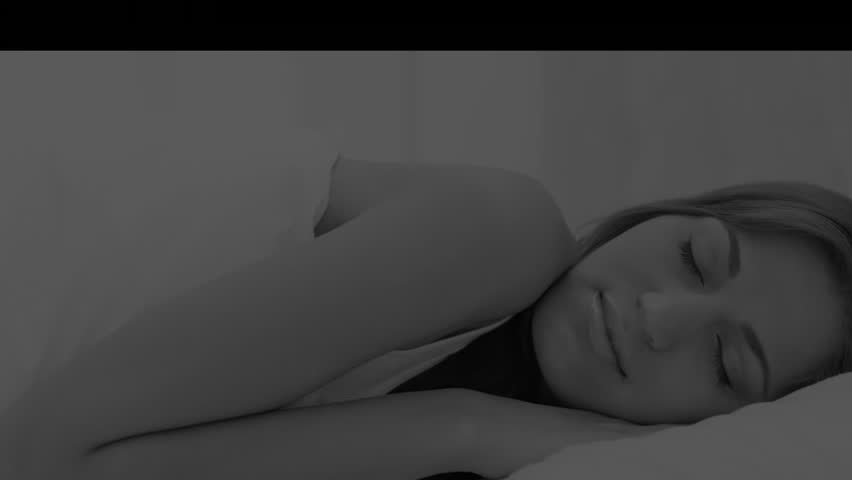 woman lying sideways in bedroom showing medical brain hologram with digital waveform grid. Sleep, relaxation, neuroscience, technology, wellness, healthcare, futuristic - Powered by Shutterstock - Get 15% off with code: PIKWIZARD15