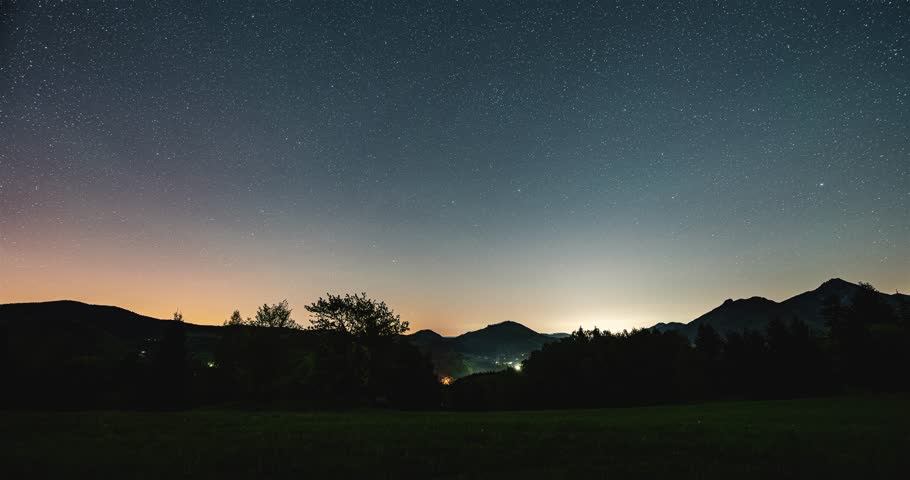 Starry Night Sky Over Countryside Landscape with Moonlight, Time Lapse Nature