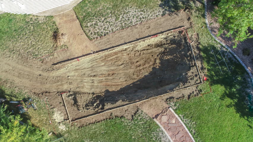 Aerial of The Before and After Building of A Back Yard Swimming Pool.
