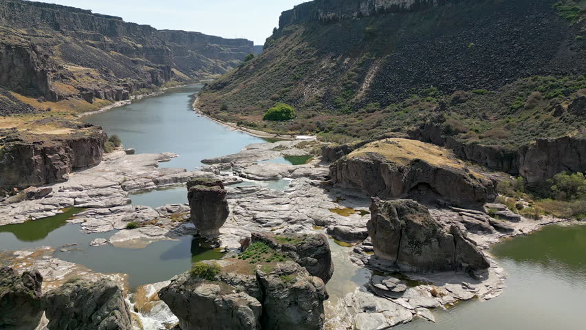 Aerial view flying down towards Pillar Falls in Idaho through the Snake River Canyon.
