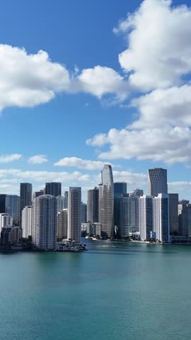 Aerial drone view of downtown Miami, Florida with famous American landmarks. Vertical video