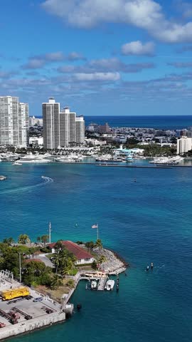 Aerial drone view of Miami Beach, Florida during summer vacation. Vertical video