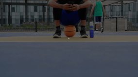 Man crouching over ball holding smartphone on outdoor sports court, showing data network overlay. Athletic, teamwork, innovation, digital, modern, fitness, technology - Powered by Shutterstock - Get 15% off with code: PIKWIZARD15