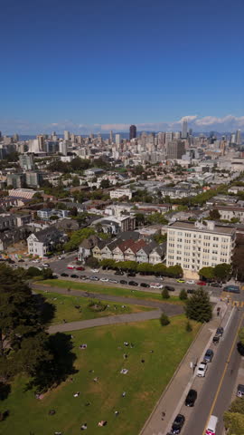 Stunning video showcases breathtaking aerial views of San Franciscos Painted Ladies neighborhoods, framed by impressive skyline that highlights the citys charm and appeal to visitors. California. USA