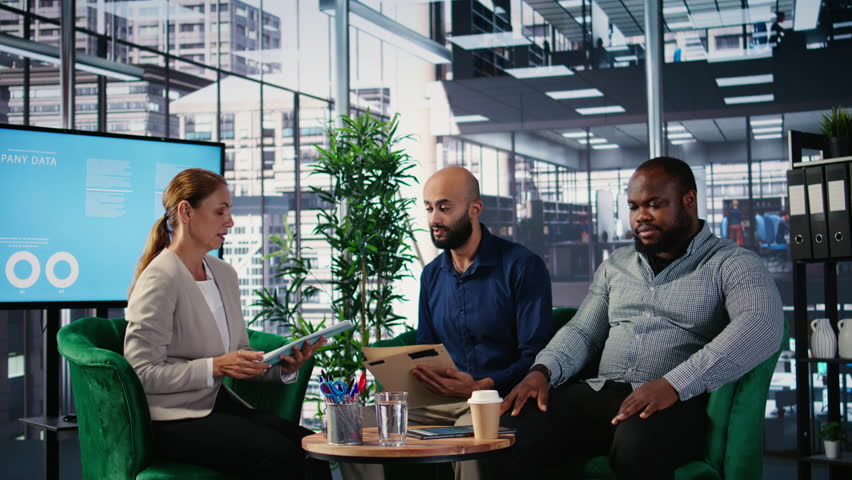 African american business entrepreneur feels worried and overworked during an executive meeting, goal oriented powerful people. Male CEO yawning in the conference room. Camera A.