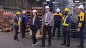 Multi-ethnic warehouse team completes daily task with pride and celebrates success together after productive teamwork. - Powered by Shutterstock - Get 15% off with code: PIKWIZARD15