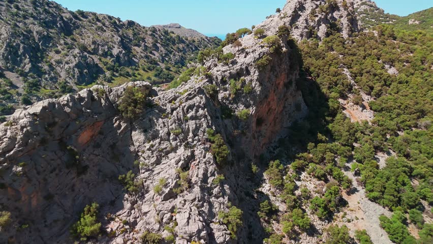 Aerial view of Panta de Gorg Blau lake in Mallorca, Balearic Islands, Spain. Beautiful artificial reservoir of drinking water in the valley between Puig Major and Puig de Massanella on Majorca island