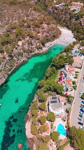 Aerial view of the Bay of Cala Pi in Mallorca, Balearic Islands, Spain. Stunning Mediterranean Sea coast with turquoise water sea bay and white sand beach. Mallorca travel destinations