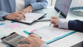 Expert woman asian female people review data number costing managerial account prepare monthly actual cost variance report income tax at audit office. ESG budget control ERP process service project. - Powered by Shutterstock - Get 15% off with code: PIKWIZARD15