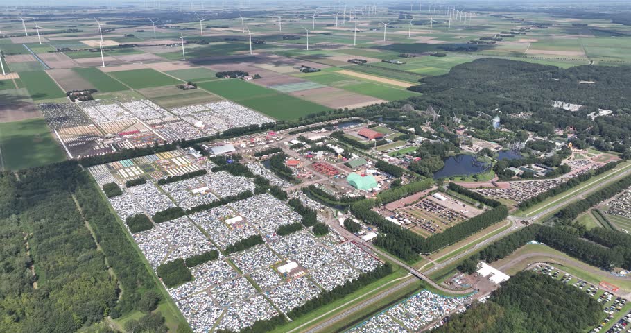 music festival event, camping, stages, tents, aerial drone video.