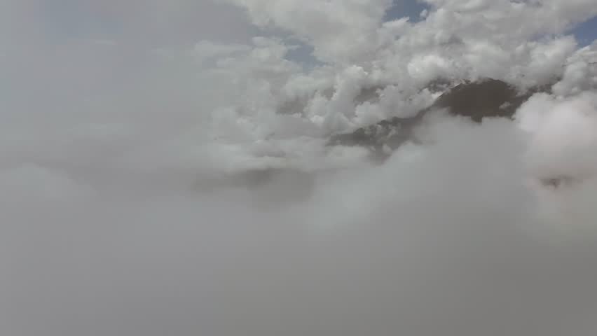 flying over clouds mountain landscape blue sky