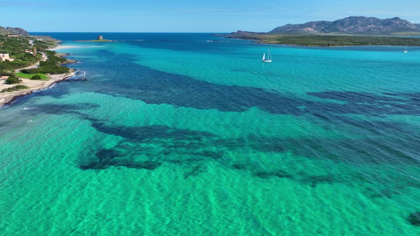 Sardinian coastline, drone view, crystal sea at the beach in Sardinias, vacations in Italy, turquoise Mediterranean Sea in Sardinia, Italy