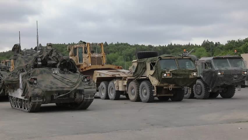 US Army Soldiers Preparing Dozens of Armored Fighting Vehicles.