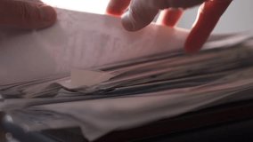 Close-up shot of a businessman working with documents in an office - Powered by Shutterstock - Get 15% off with code: PIKWIZARD15