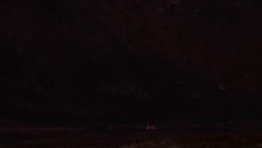 U.S. Marines conduct High Mobility Artillery Rocket System live fire at night.