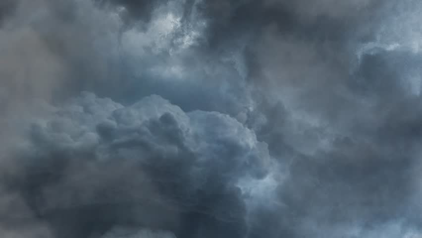 Lightning Strikes Across the Sky During a Fierce Thunderstorm at Dusk