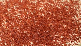 Fresh Chili Peppers Fall Into Crushed Dry Chili Pepper Seasoning Side View Slow Motion. - Powered by Shutterstock - Get 15% off with code: PIKWIZARD15