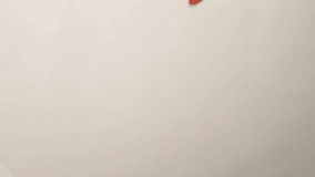 Red Chili Pepper Dropping into Water in Slow Motion - Powered by Shutterstock - Get 15% off with code: PIKWIZARD15