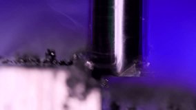 Close-Up of Rotary Milling Cutter Spinning and Creating Light Smoke from Friction While Working on Metal Surface - Powered by Shutterstock - Get 15% off with code: PIKWIZARD15