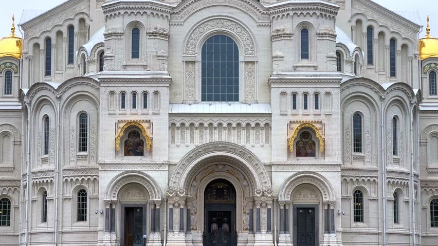 KRONSTADT, Russia - September 14, 2024: St. Nicholas Naval Cathedral. The Kronstadt Naval Cathedral on Yakornaya Square in cloudy weather in autumn. Autumn Kronstadt. Kotlin Island. 4K