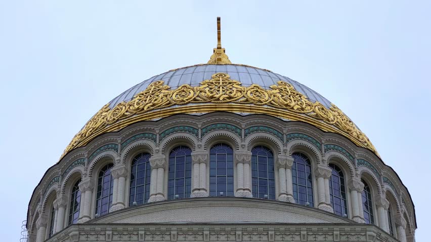 KRONSTADT, Russia - September 14, 2024: St. Nicholas Naval Cathedral. The Kronstadt Naval Cathedral on Yakornaya Square in cloudy weather in autumn. Autumn Kronstadt. Kotlin Island. 4K