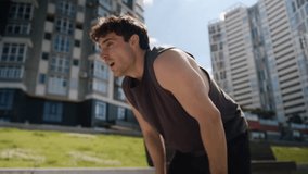 Exhausted Caucasian European young man tired guy male athlete outdoors sportsman break jog running sport training workout hard breath sweaty stop relax sportive activity lifestyle runner city street - Powered by Shutterstock - Get 15% off with code: PIKWIZARD15