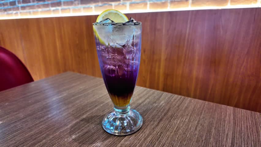 Butterfly pea flower drink with lime , honey and mint leaf , fresh herbal healthy detox drink