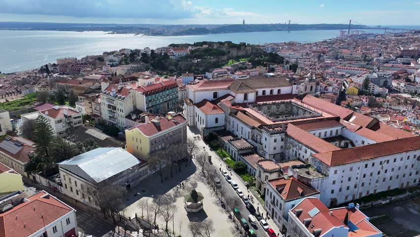 Lisbon Skyline At District Of Lisbon Portugal. Aerial View Of A Bustling City With High-Rise Buildings And Traffic. Town Sky Backgrounds Urban. Town Panorama. Lisbon District of Lisbon.
